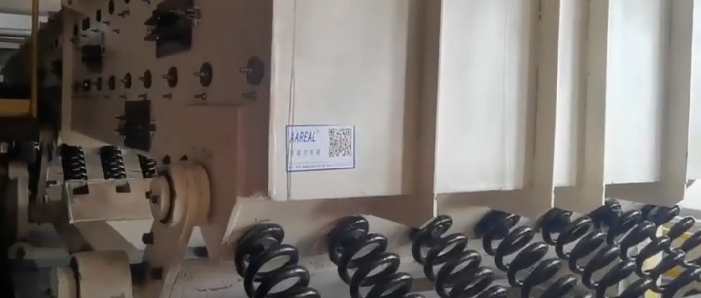 الناقل الاهتزازي ذو النوابض اللولبية