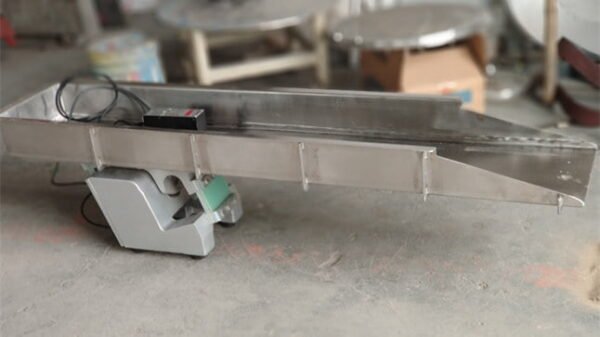 Электромагнитный вибрационный питатель (тип сиденья)